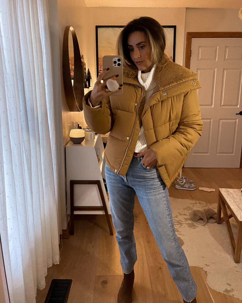 Karina Style Diaries wearing abercrombie turtleneck sweater, mini puffer jacket, high rise jeans, wester ankle booties, fall style