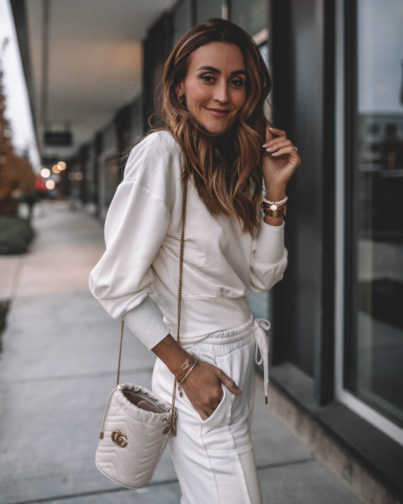 Karina Wears walmart white jogger set with sneakers and gucci bag