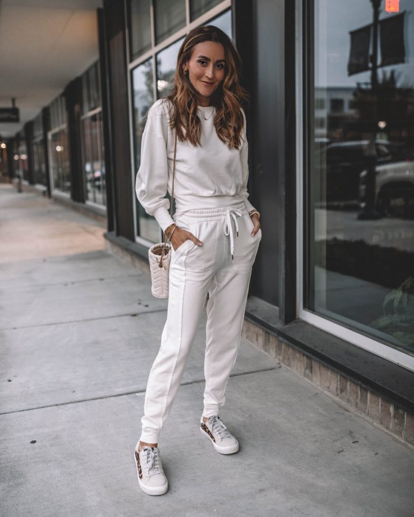 Karina Wears walmart white jogger set with sneakers and gucci bag