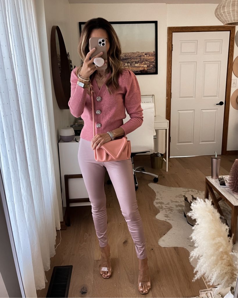 Karina wears pink express sweater and pink pant