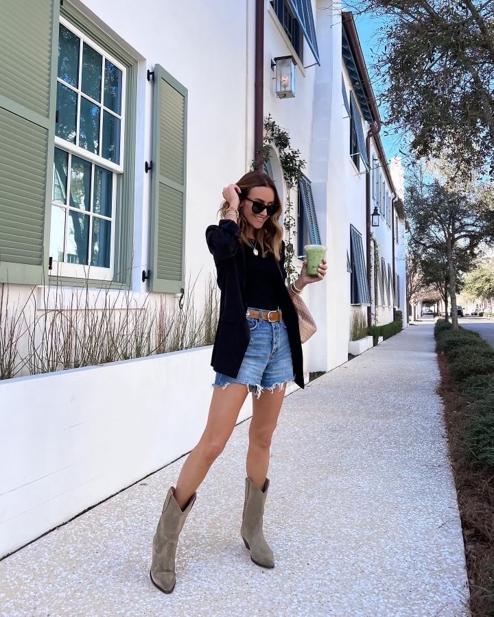 Karina wears isabel marant boots from nordstrom with denim shorts and blazer