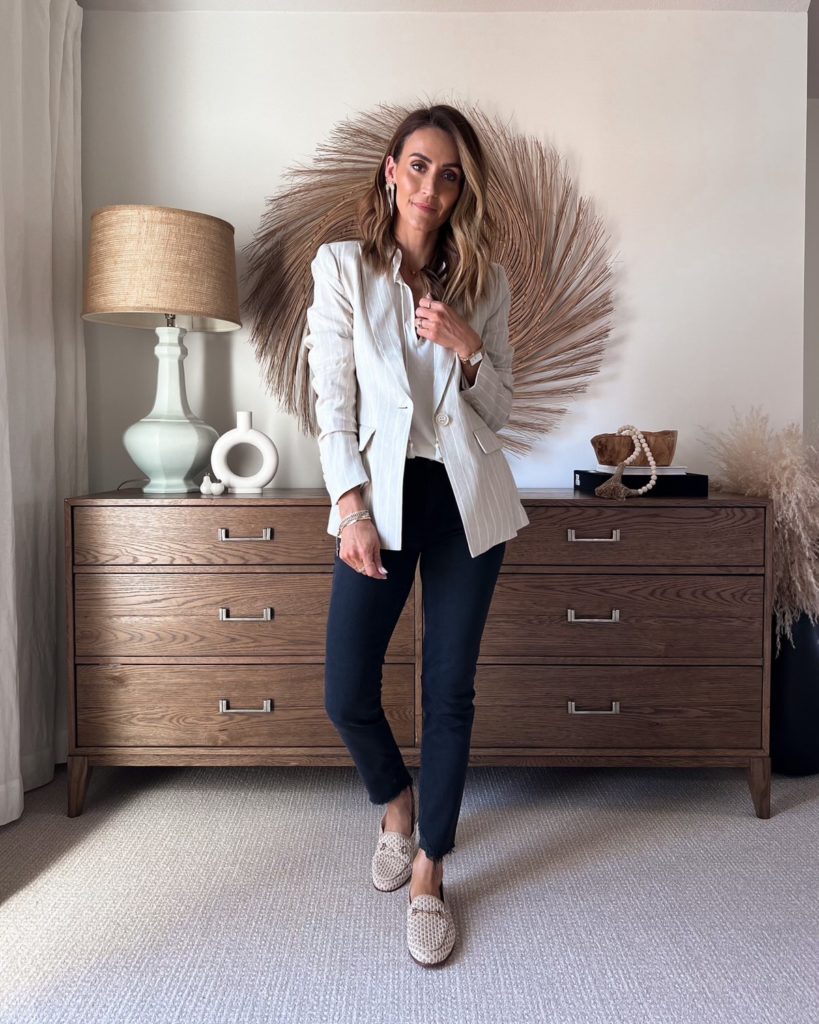Karina wears evereve cream blazer with jeans and loafers