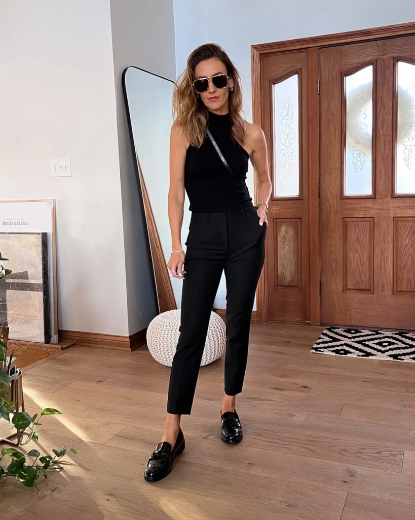 Karina wears white house black market trousers with heartloom tank and amazon loafers