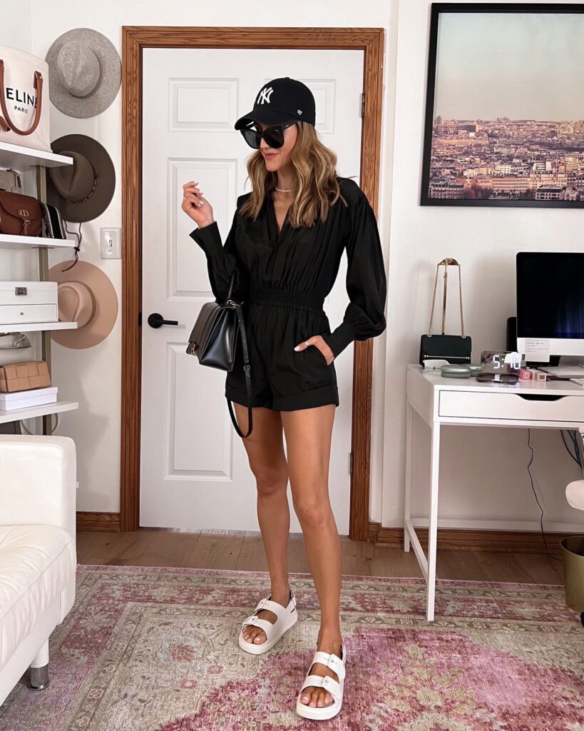 Karina wears gucci dad sandal with black romper and ball cap