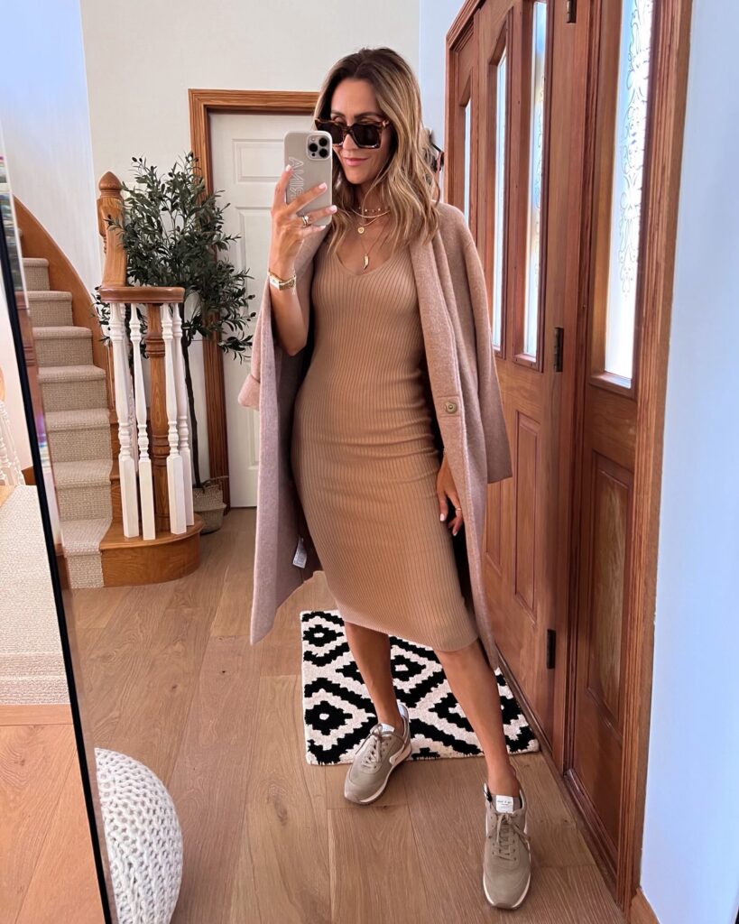karina wears nordstrom tan ribbed sweater tank dress with vince coat and sneakers