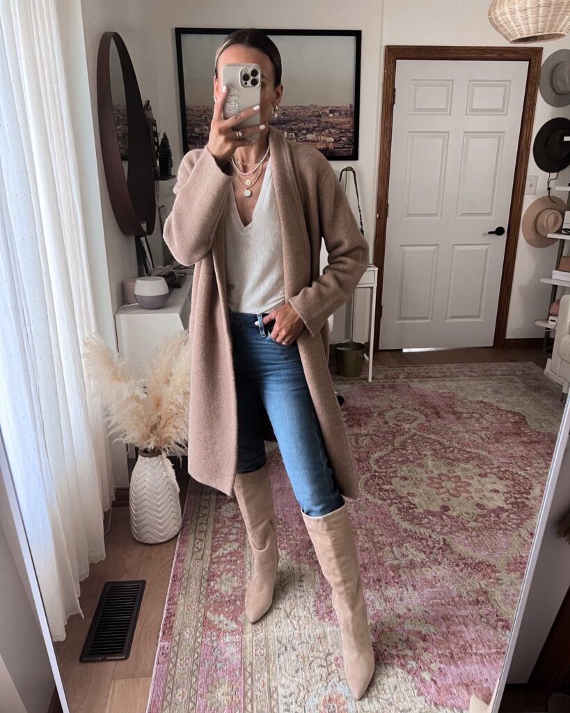 karina wears FRAME jeans with open edit sweater and vince coat