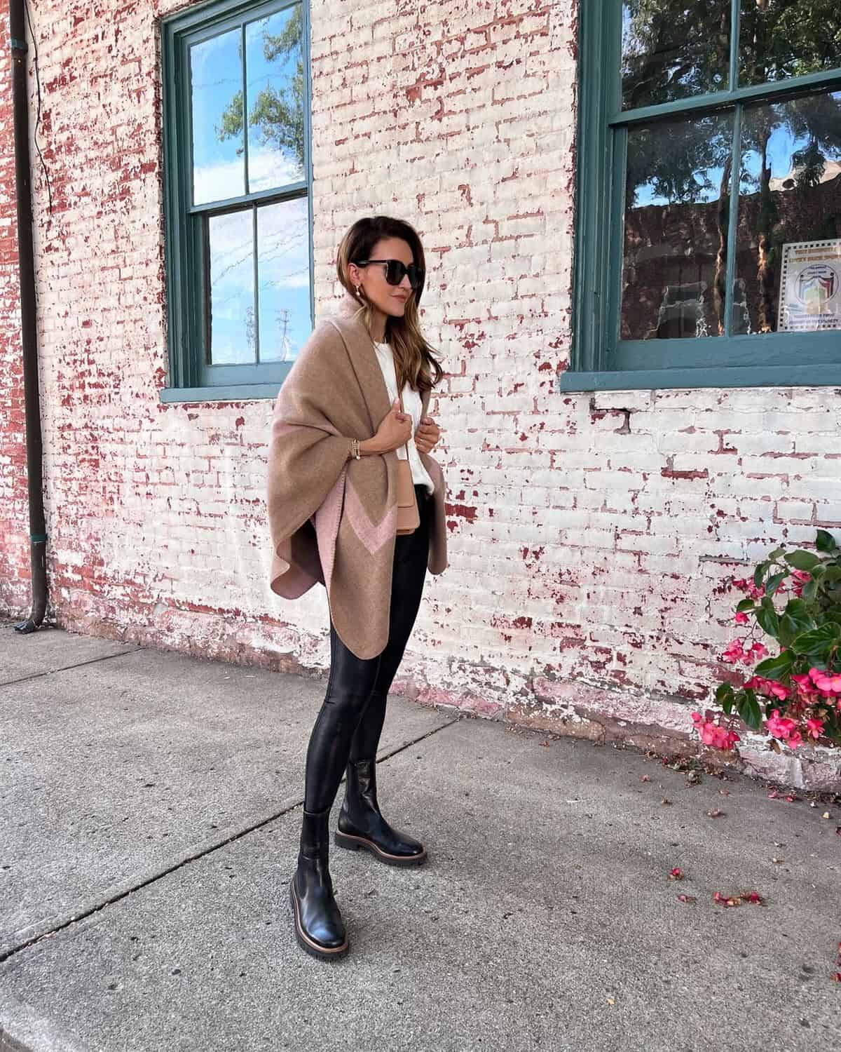 Karina wears walmart blanket scarf with sweater and faux leather leggings