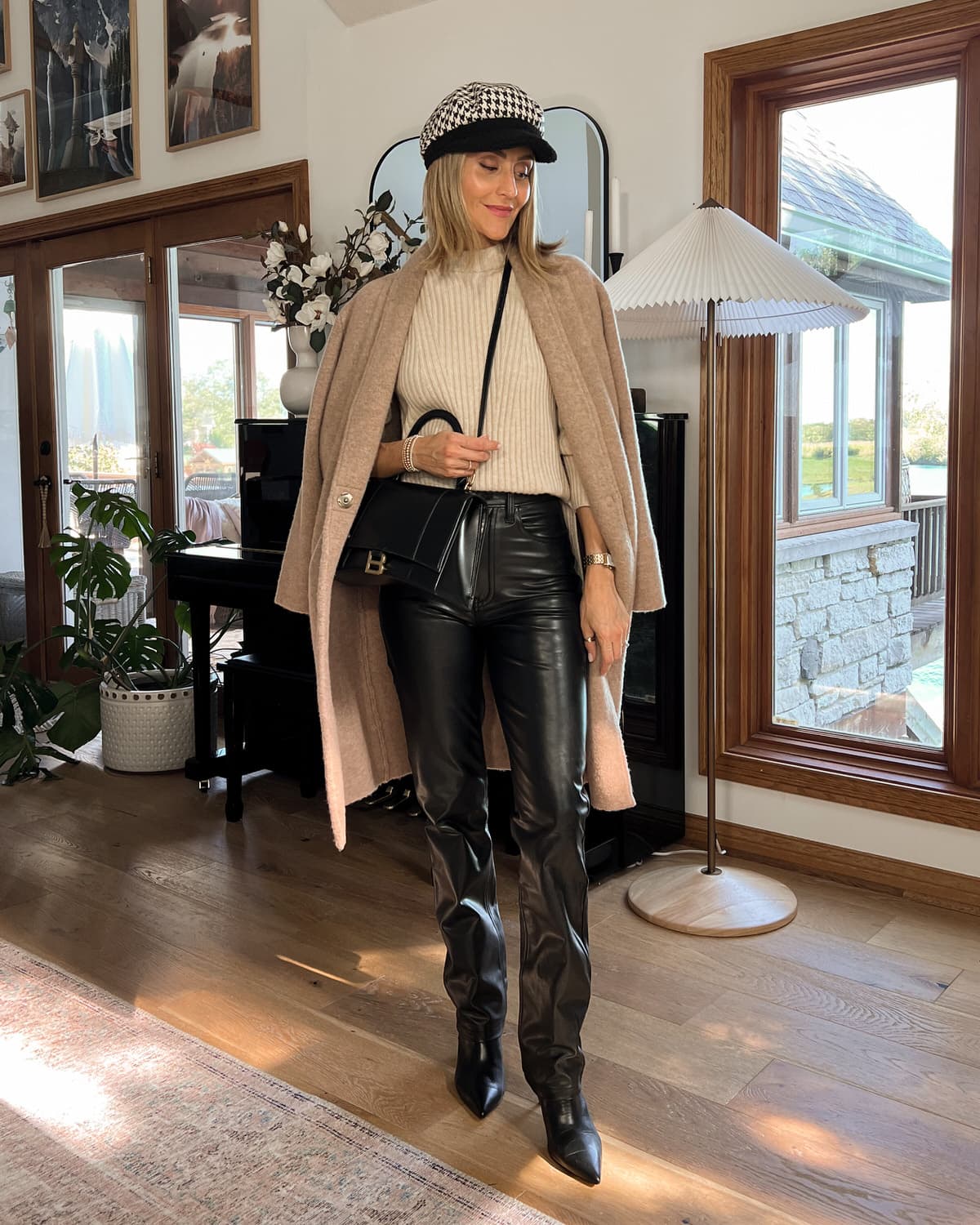 Karina wears leather pants with Vince sweater and cardi coat