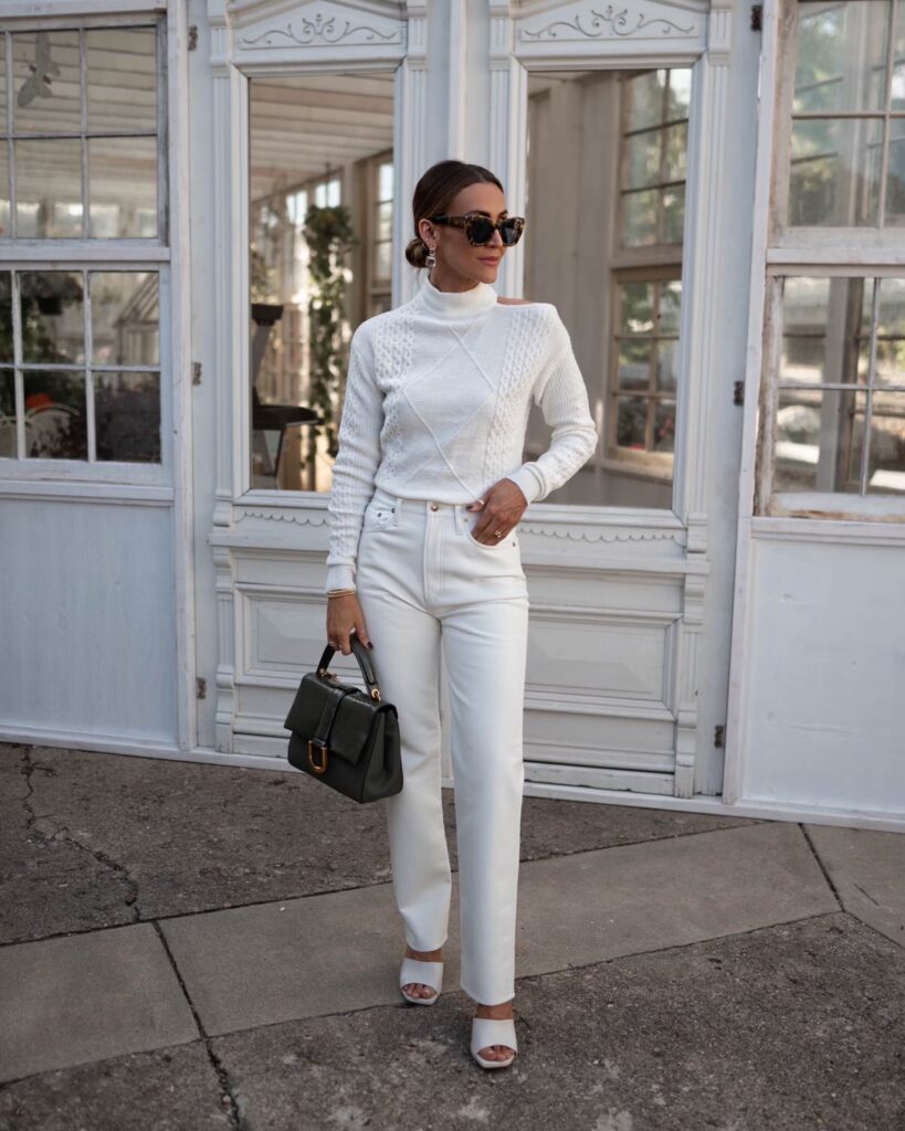 Karina wears Walmart white sweater with Agolde white leather pants