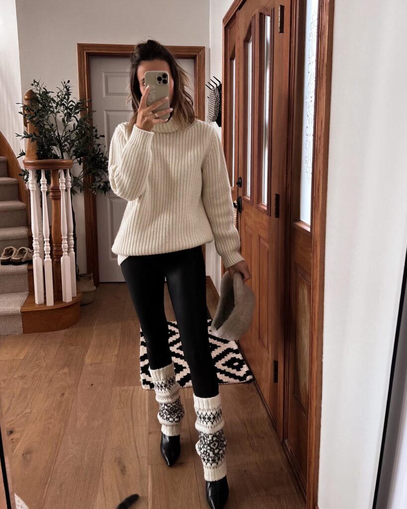 Karina wears Peruvian Connection oversized sweater with faux fur hat and leg warmers