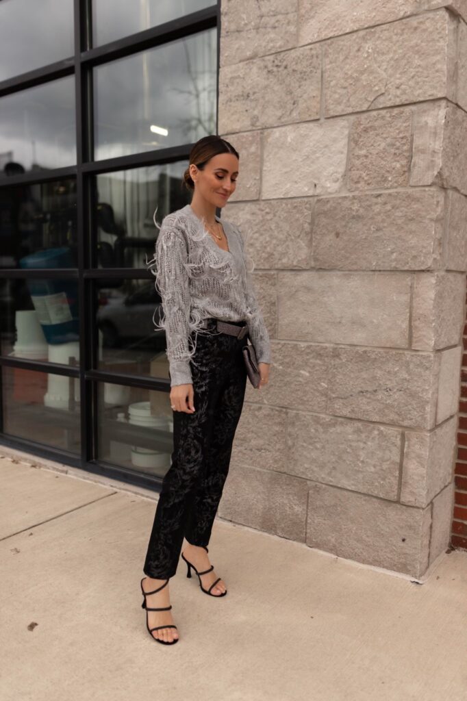 Karina wears WHBM feather and sequin sweater with floral pant