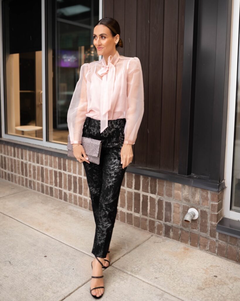 Karina wears WHBM pink blouse with floral pant