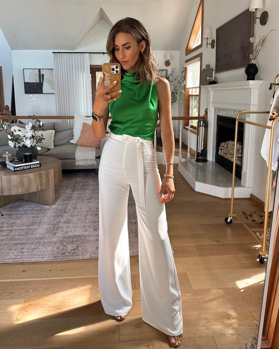 White wide leg pants and satin green top