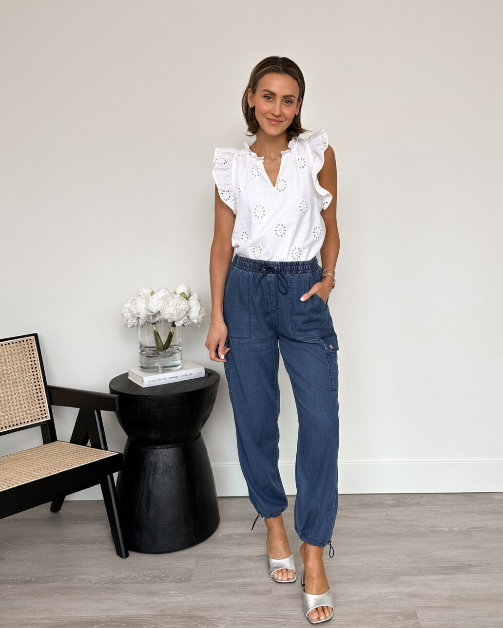 cargo pant outfit with white top and heels