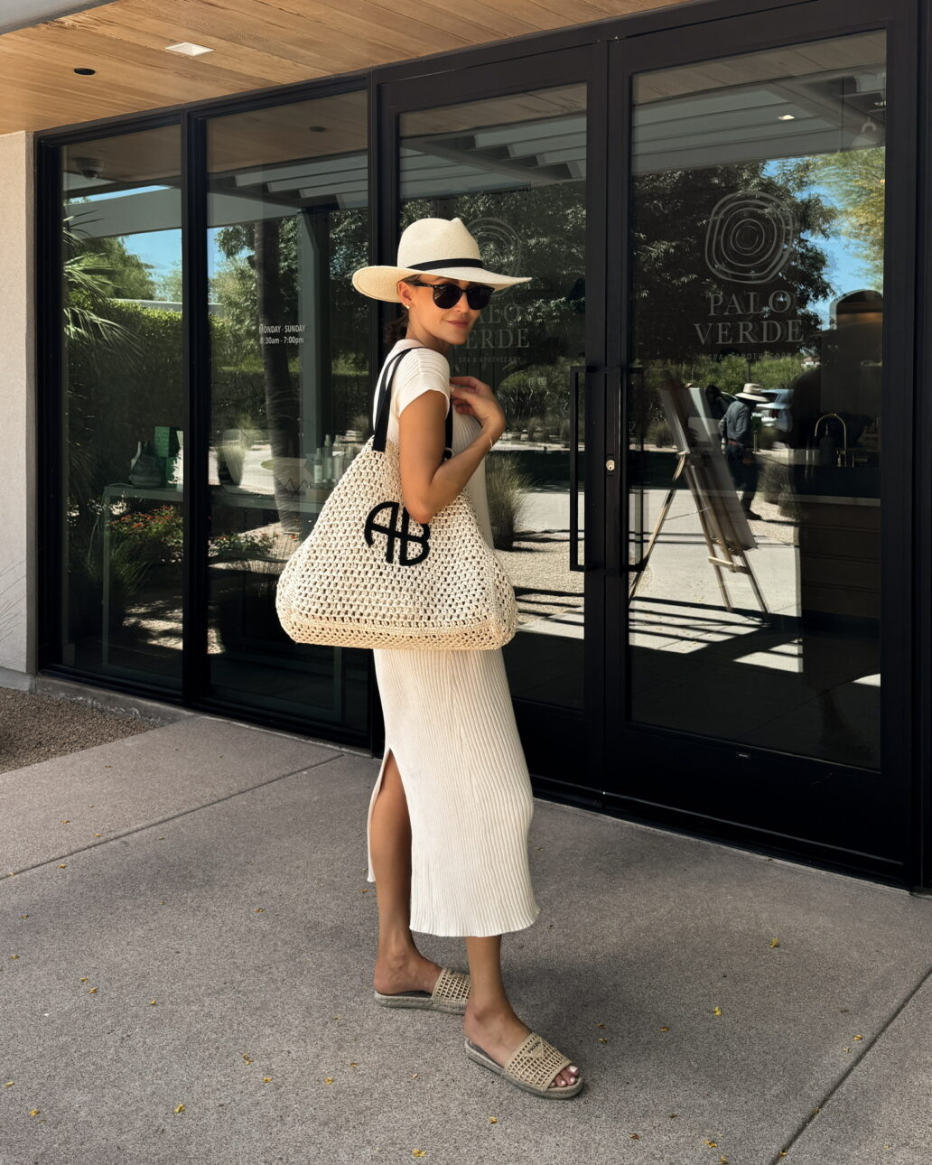 ribbed knit dress with raffia sandals and a wide brimmed hat