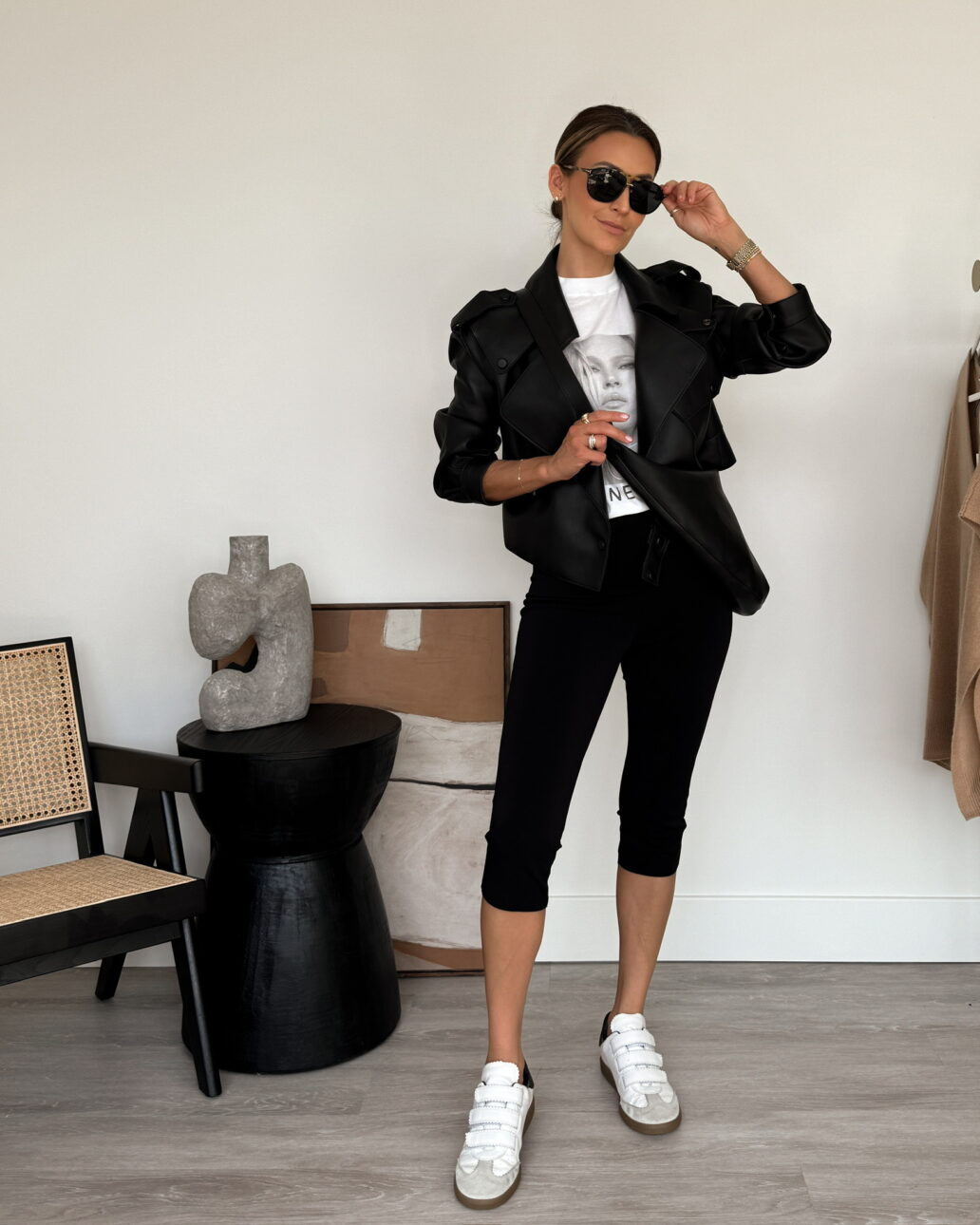 capri pant outfit with sneakers and a leather jacket