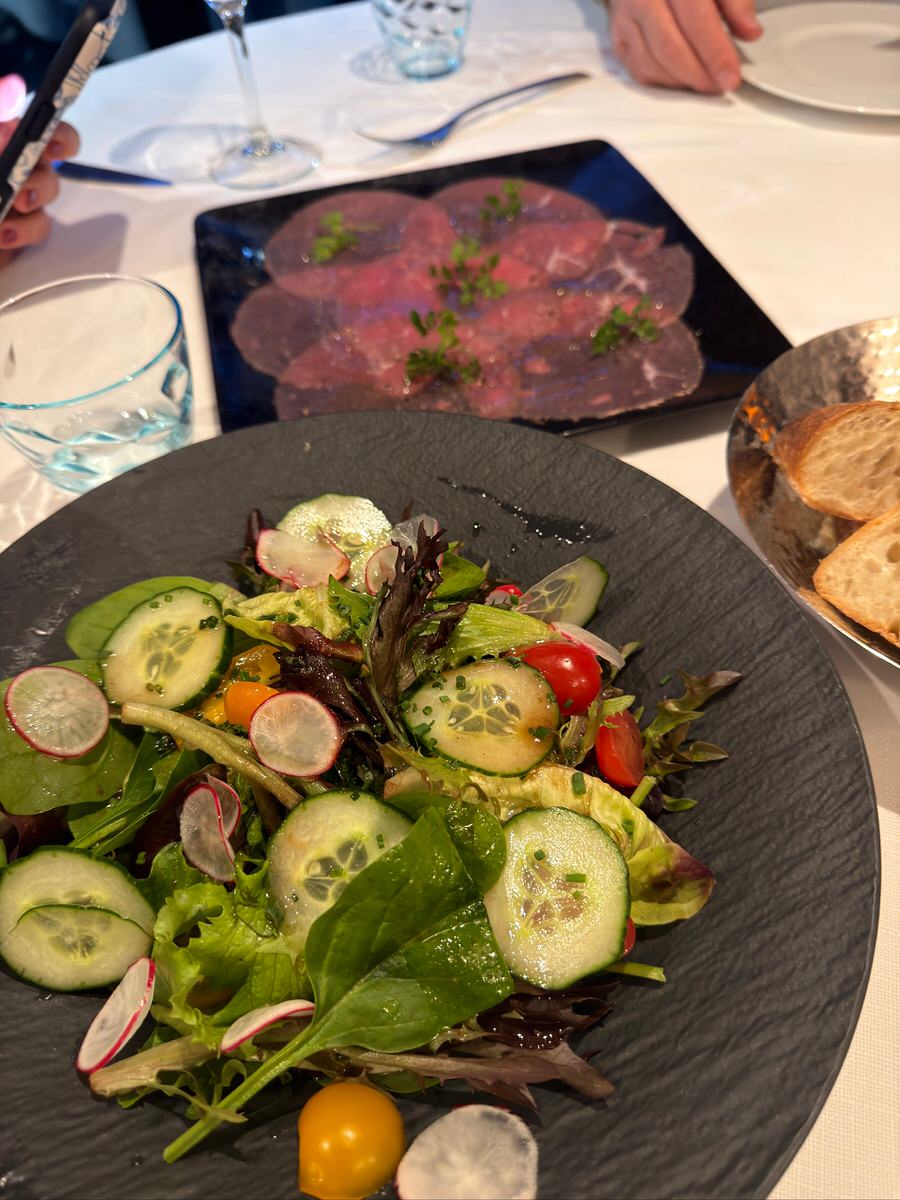 carpaccio and salad at atmosphere restaurant